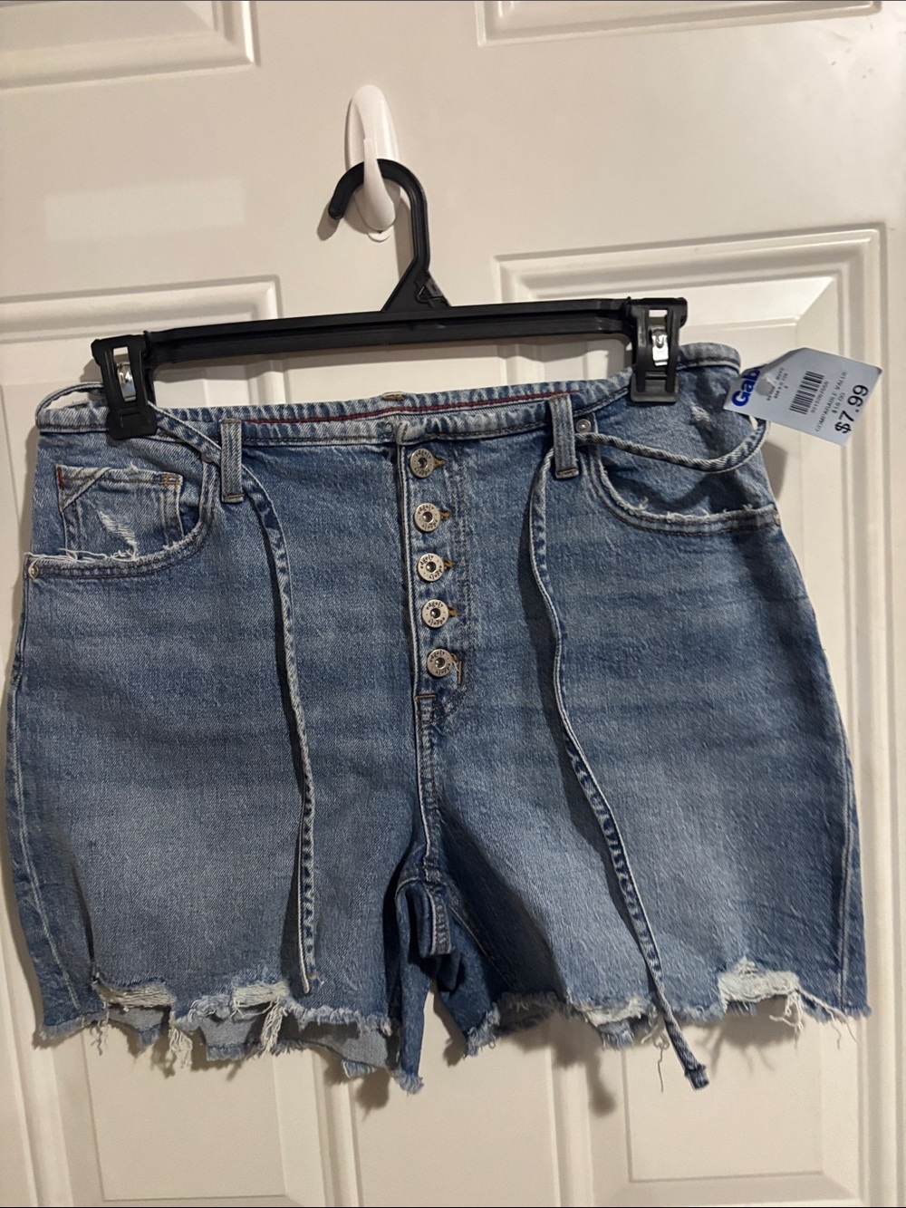 High-Rise Light Blue Distressed Denim Shorts with Button Front